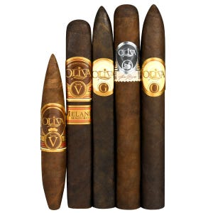A selection of Oliva cigars featuring various series, including Serie V, Melanio Maduro, Serie G, and Serie O, each with distinct labels and sizes.