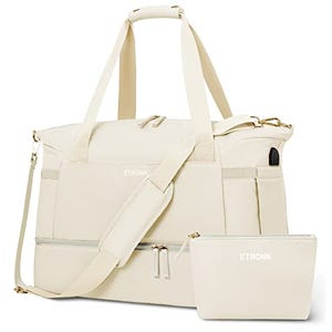 A cream-colored Etronik large travel bag with multiple external pockets, complemented by a smaller matching pouch, both featuring a minimalist design and detachable shoulder straps.