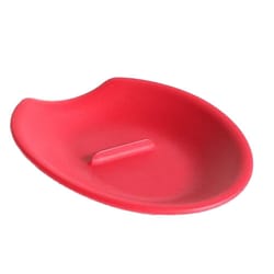 A red, oval-shaped spoon rest designed for cracking eggs, featuring a central raised edge to crack eggshells efficiently.