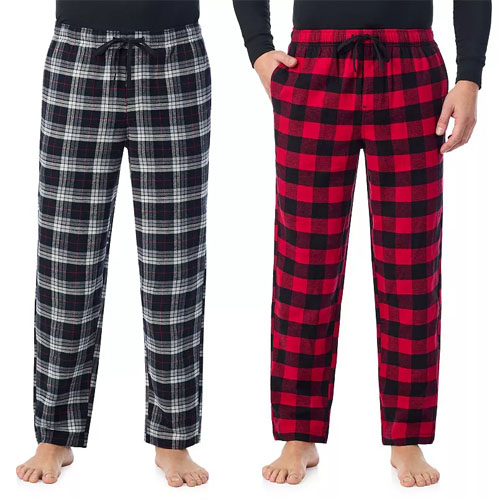 Two pairs of plaid pajama pants, one with black and white checks and the other with red and black checks, both featuring drawstrings and pockets.