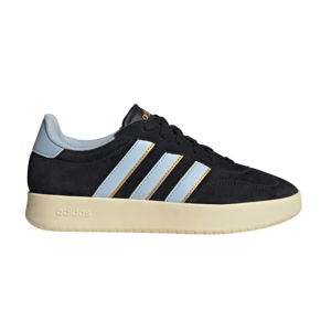 A black Adidas sneaker with light blue stripes, gold accents, and a beige sole.