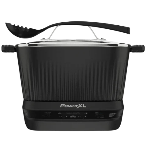 PowerXL electric multicooker with a deep, ribbed black design and digital control panel, accompanied by a matching pasta spoon.