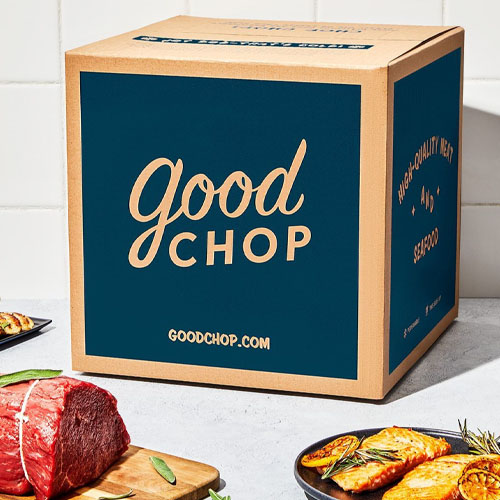 A box labeled \“Good Chop\“ suggests it contains high-quality meat, alongside raw meat cuts and grilled dishes.
