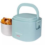 A light blue portable electric lunch box with a handle, designed for heating food, displayed with a metal food container filled with mac and cheese.