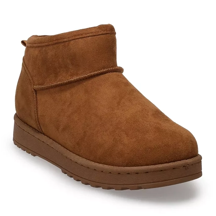 Tan suede ankle boots with a plush lining and a flat, ridged rubber sole.