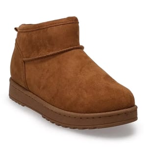Tan suede ankle boots with a plush lining and a flat, ridged rubber sole.