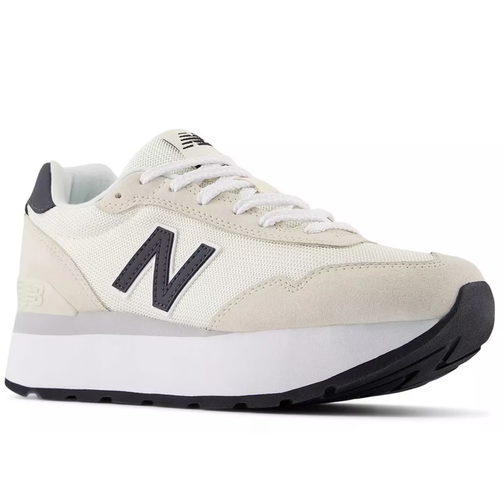 New Balance sneaker featuring a white mesh upper, beige suede accents, and a raised black sole. The shoe displays the iconic 'N' logo on the side.