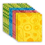 A stack of colorful Swedish dishcloths in various patterns including fruits and botanical designs, in yellow, pink, blue, and green shades.