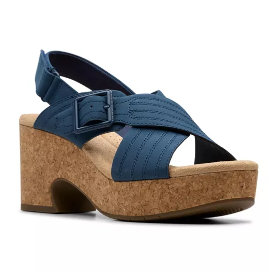 Blue leather wedge sandals with an adjustable buckle closure and cork platform.