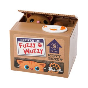A brown plastic coin bank shaped like a box with a cat inside, labeled \“Deliver to: Fuzzy Wuzzy.\“ It features a button with a fish design to press, which prompts the cat to grab coins.