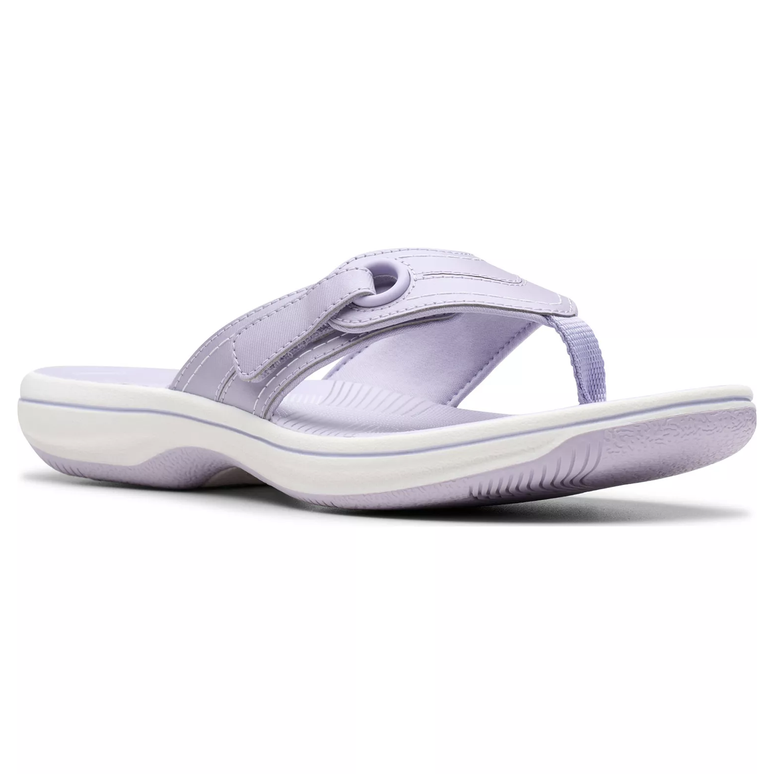 A light purple flip-flop sandal with a cushioned white sole, featuring a toe post design and stitch accents for casual comfort.