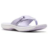 A light purple flip-flop sandal with a cushioned white sole, featuring a toe post design and stitch accents for casual comfort.