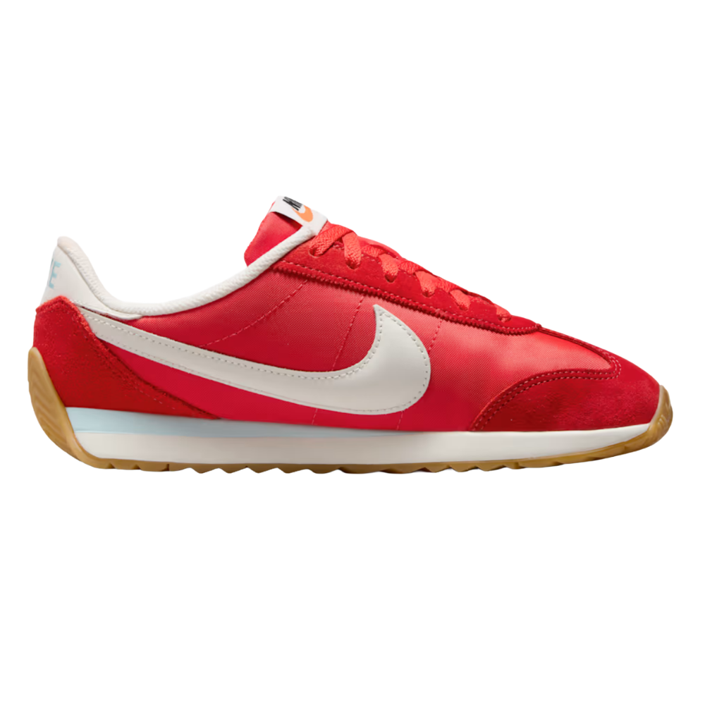 A red Nike sneaker featuring a white swoosh, white midsole, gum rubber outsole, and orange details on the top.