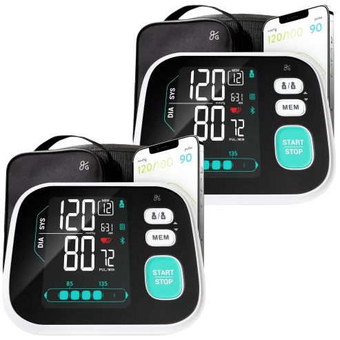 Two digital blood pressure monitors with large displays show readings for systolic and diastolic pressure, pulse rate, and include memory and start/stop buttons.
