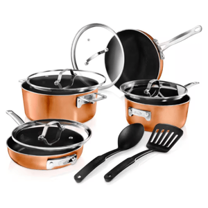 A set of copper-colored cookware including two pots, a pan, two lids, and two black utensils.