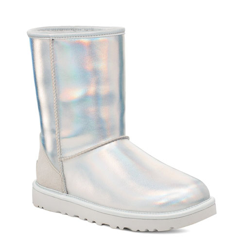 Iridescent silver short boots with a rounded toe, plush lining, and flat sole, featuring a mid-calf height.