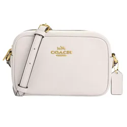 A white Coach crossbody bag featuring gold hardware, a zip closure, and an adjustable strap.