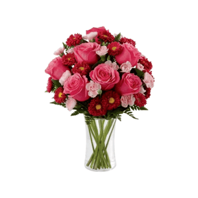A bouquet featuring pink roses, pink carnations, and red chrysanthemums arranged in a clear glass vase.