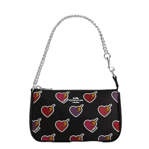 Coach Outlet Nolita Heart Bolt features a black design with colorful heart and lightning bolt motifs, a silver-tone chain strap, and a small Coach logo in the center.