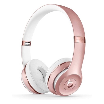 Rose gold and white wireless headphones with an over-ear design and a prominent logo on the side.