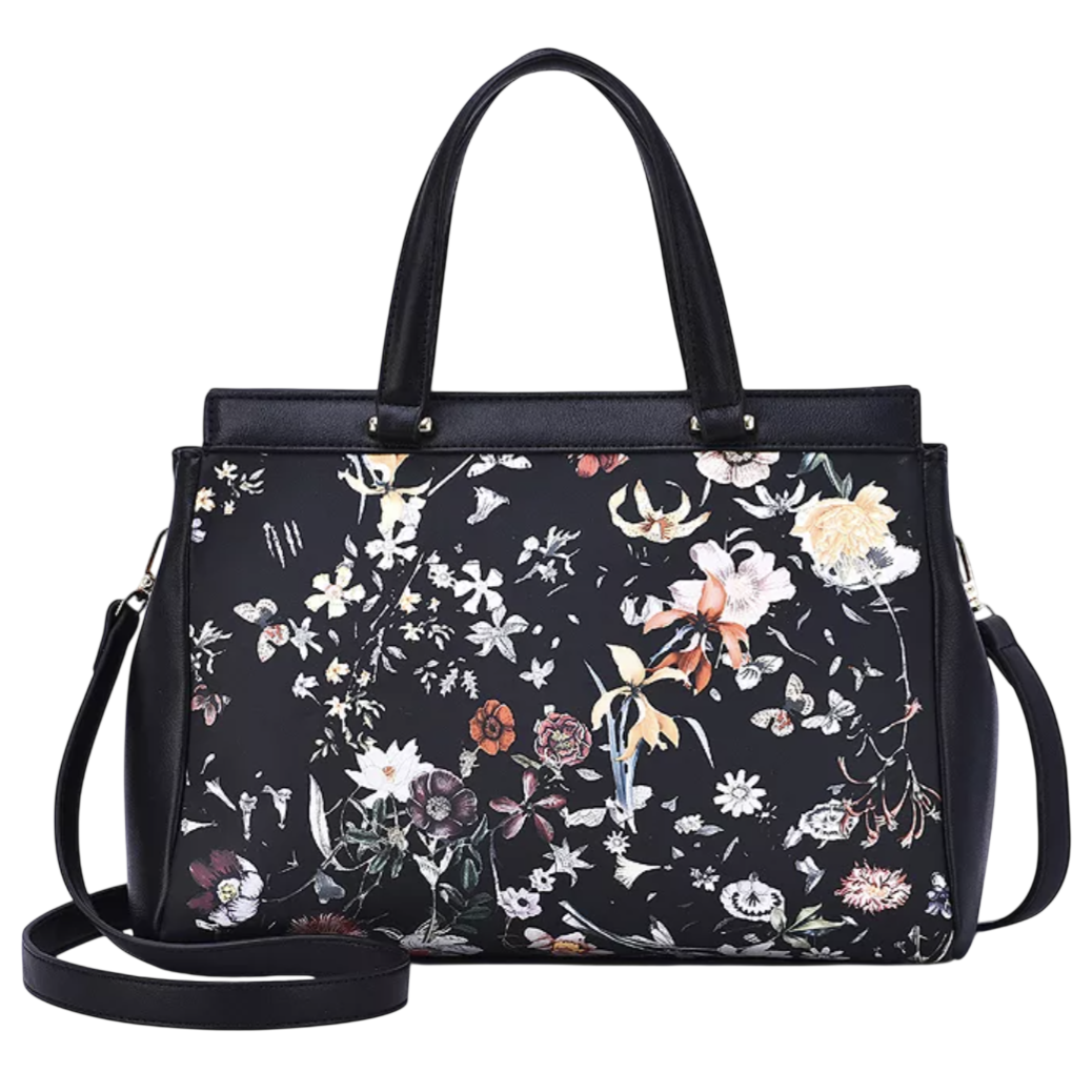 A black handbag featuring a floral pattern with a detachable shoulder strap and top handles.