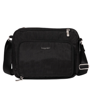 A black crossbody bag with silver zippers and the \“Baggallini\“ logo on the front. It features an adjustable shoulder strap and a front zip pocket.