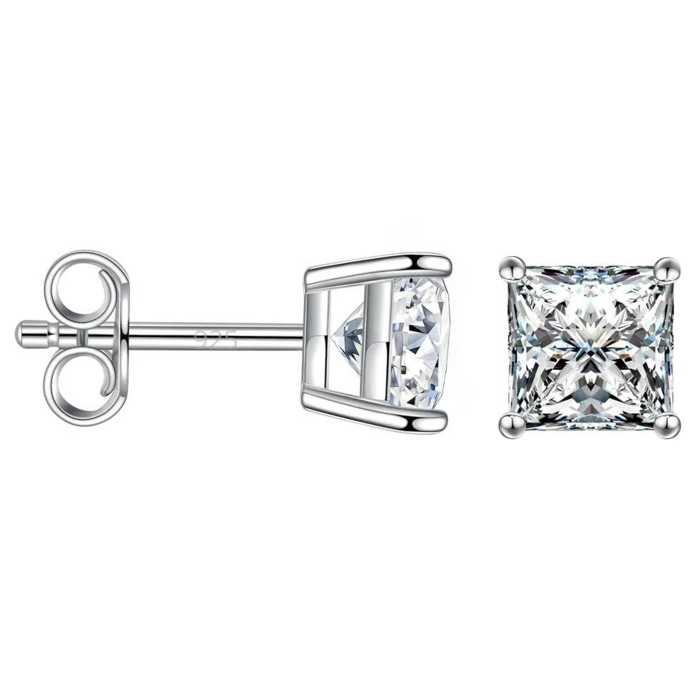 A pair of sterling silver stud earrings featuring square-cut genuine moissanite stones with a four-prong setting, showcasing intricate faceting and a polished finish.