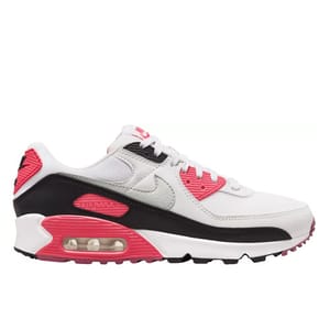 A white, black, and pink Nike Air Max 90 sneaker with visible air cushioning in the sole, featuring a sleek design with a mix of leather and mesh materials.