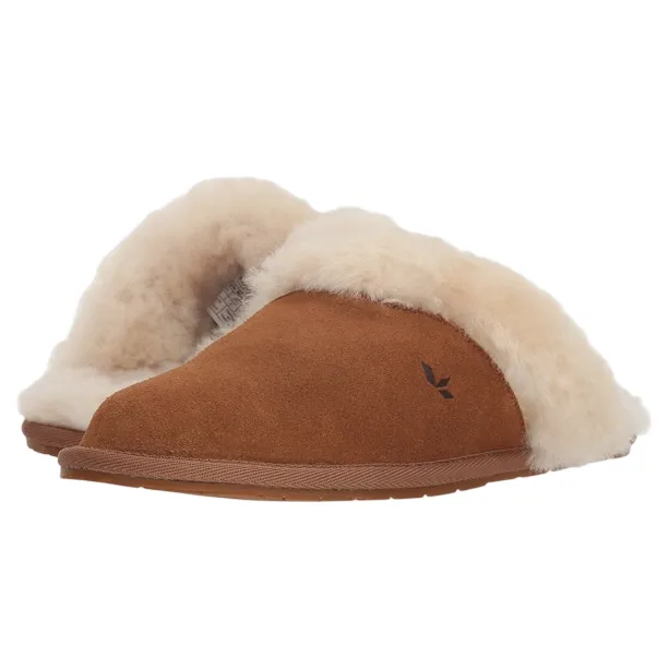 Brown suede slippers with plush, cream-colored shearling lining and a small logo on the side.