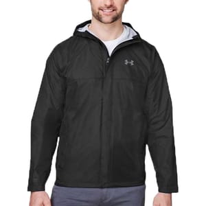 Black hooded jacket with a front zipper and a subtle logo on the chest, worn by a person over a white shirt.