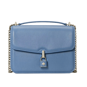 Blue leather shoulder bag with a top handle and chain strap. Features a front flap with a lock closure adorned with a spade emblem.