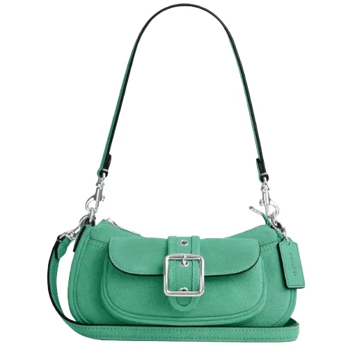 A green suede shoulder bag with a silver buckle and detachable strap features a front pocket and a small tag.