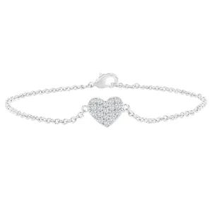 Silver bracelet with a heart-shaped charm encrusted with small sparkling stones, featuring a delicate chain and a lobster clasp.