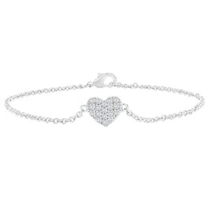Silver bracelet with a heart-shaped charm encrusted with small sparkling stones, featuring a delicate chain and a lobster clasp.