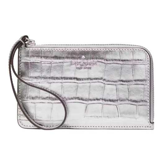 Silver Kate Spade New York wristlet with a crocodile-embossed pattern and zip closure.
