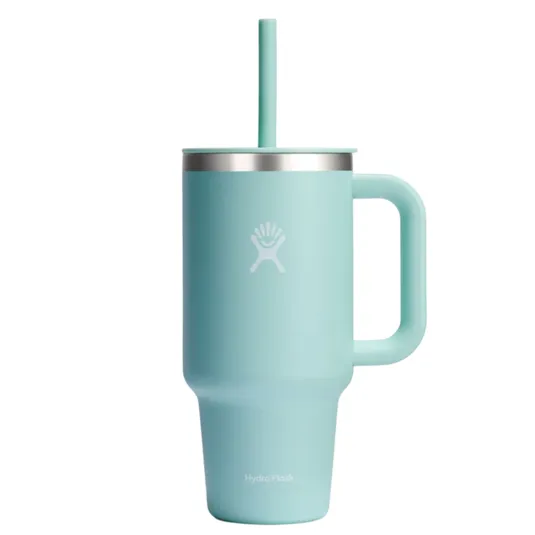 A light blue Hydro Flask mug with a handle and a matching straw, featuring a stainless steel rim and the brand's logo.