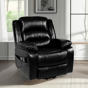 A black leather recliner with padded armrests, a cushioned back, and side pockets, situated in a bright living room setting.