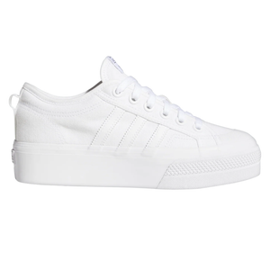 White low-top sneaker with a thick platform sole, featuring subtle stitching and a minimalist design.