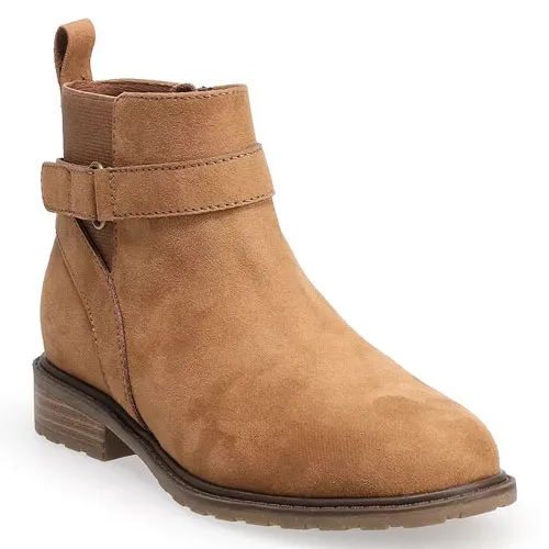 Brown suede ankle boot with a low heel, side cut-out detail, and strap buckle accent.