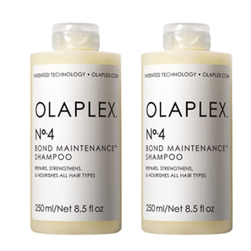 Two bottles of Olaplex No.4 Bond Maintenance Shampoo, each 250ml (8.5 fl oz), designed to repair, strengthen, and nourish all hair types.