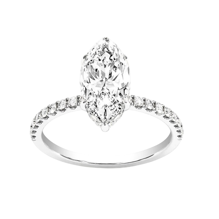 A marquise-cut diamond engagement ring features a central elongated diamond with a halo of smaller round diamonds set on a delicate band.