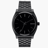 A black Nixon wristwatch with a minimalist design, featuring a black stainless steel band and a simple black analog dial with silver hour markers and hands.