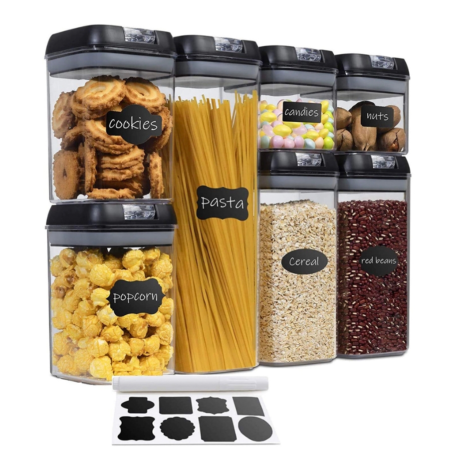 7-piece clear food storage set with black lids, includes containers for cookies, pasta, candies, nuts, popcorn, cereal, and red beans, featuring customizable chalkboard labels and a chalk marker.