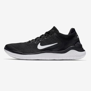 Black Nike Free Run 2018 shoes with a white swoosh logo and sole, featuring a flexible, low-profile design for natural movement.