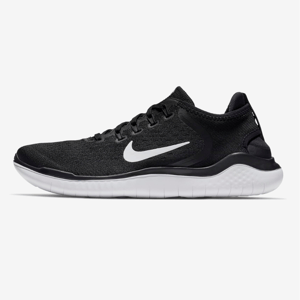 Black Nike Free Run 2018 shoes with a white swoosh logo and sole, featuring a flexible, low-profile design for natural movement.