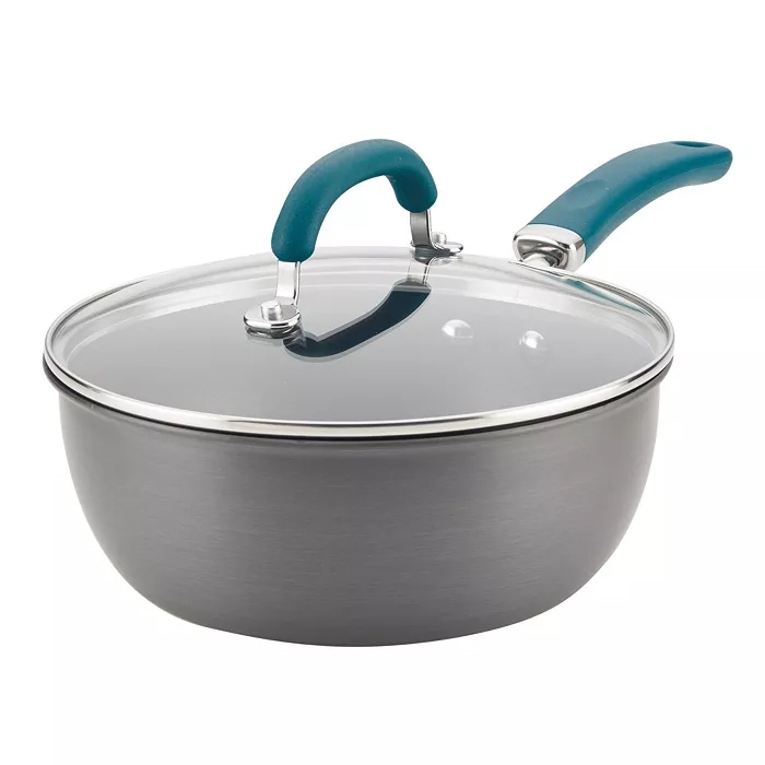 A 3-quart nonstick pan with a glass lid and a teal-colored handle and lid knob.