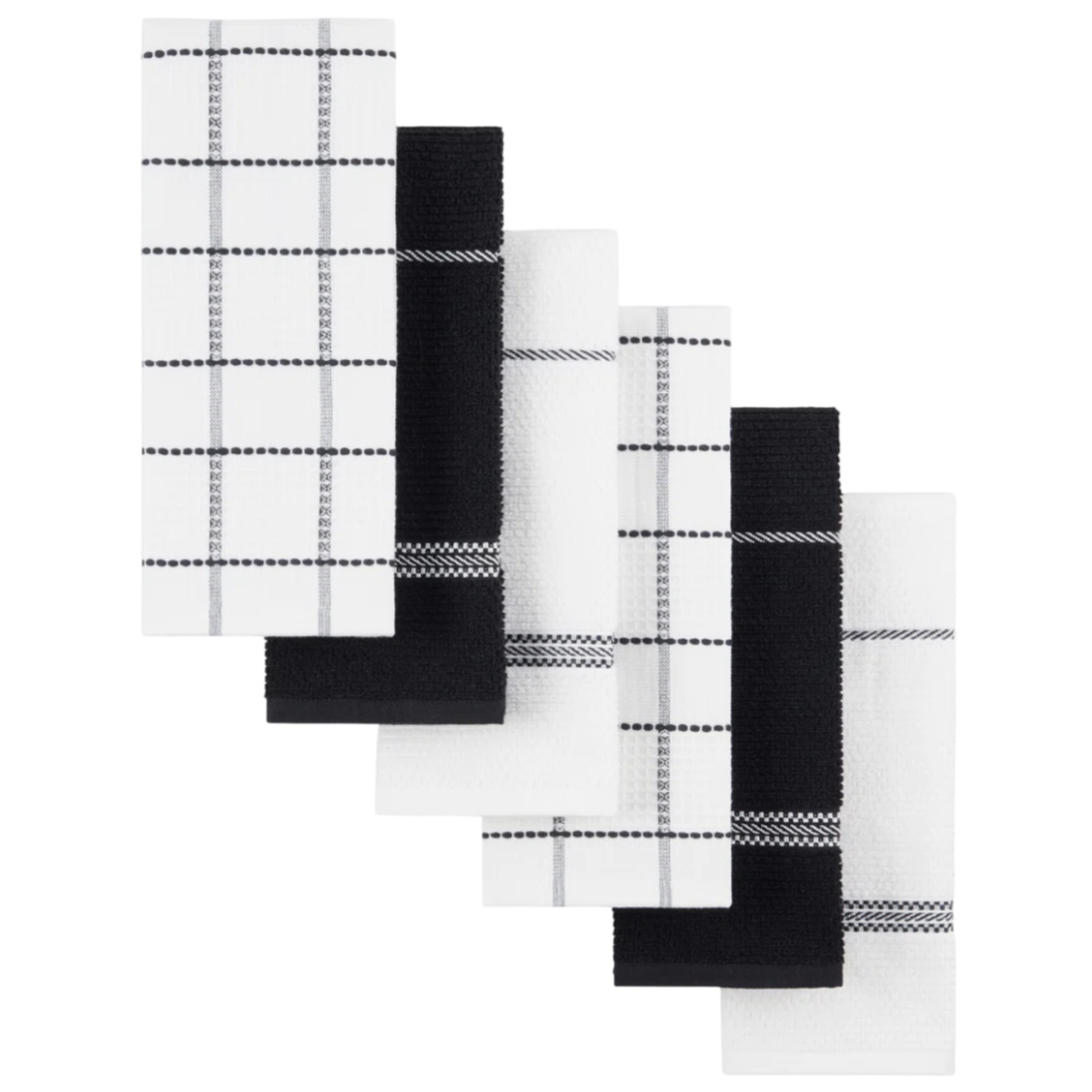 A set of six kitchen towels with a black and white theme, featuring a mix of solid colors and plaid patterns.