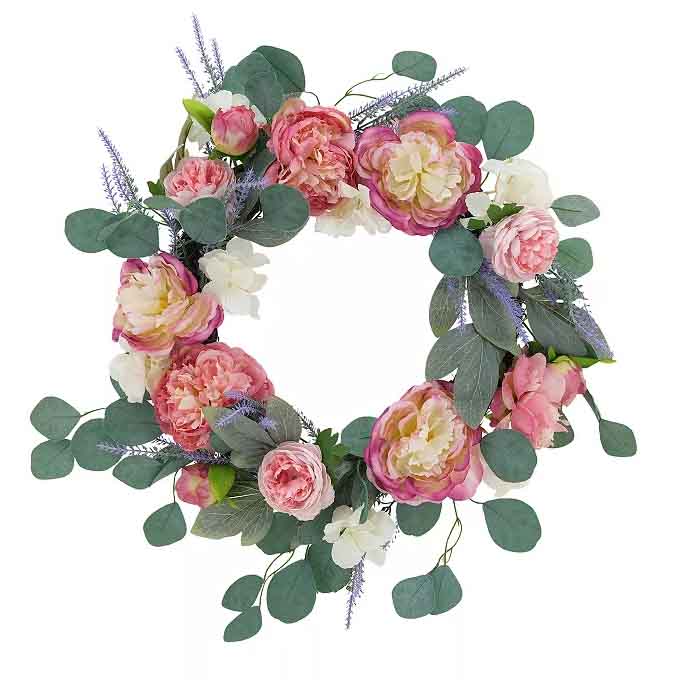 A 22-inch wreath featuring pink and cream roses, accented with green eucalyptus leaves and small lavender sprigs, arranged in a circular shape.