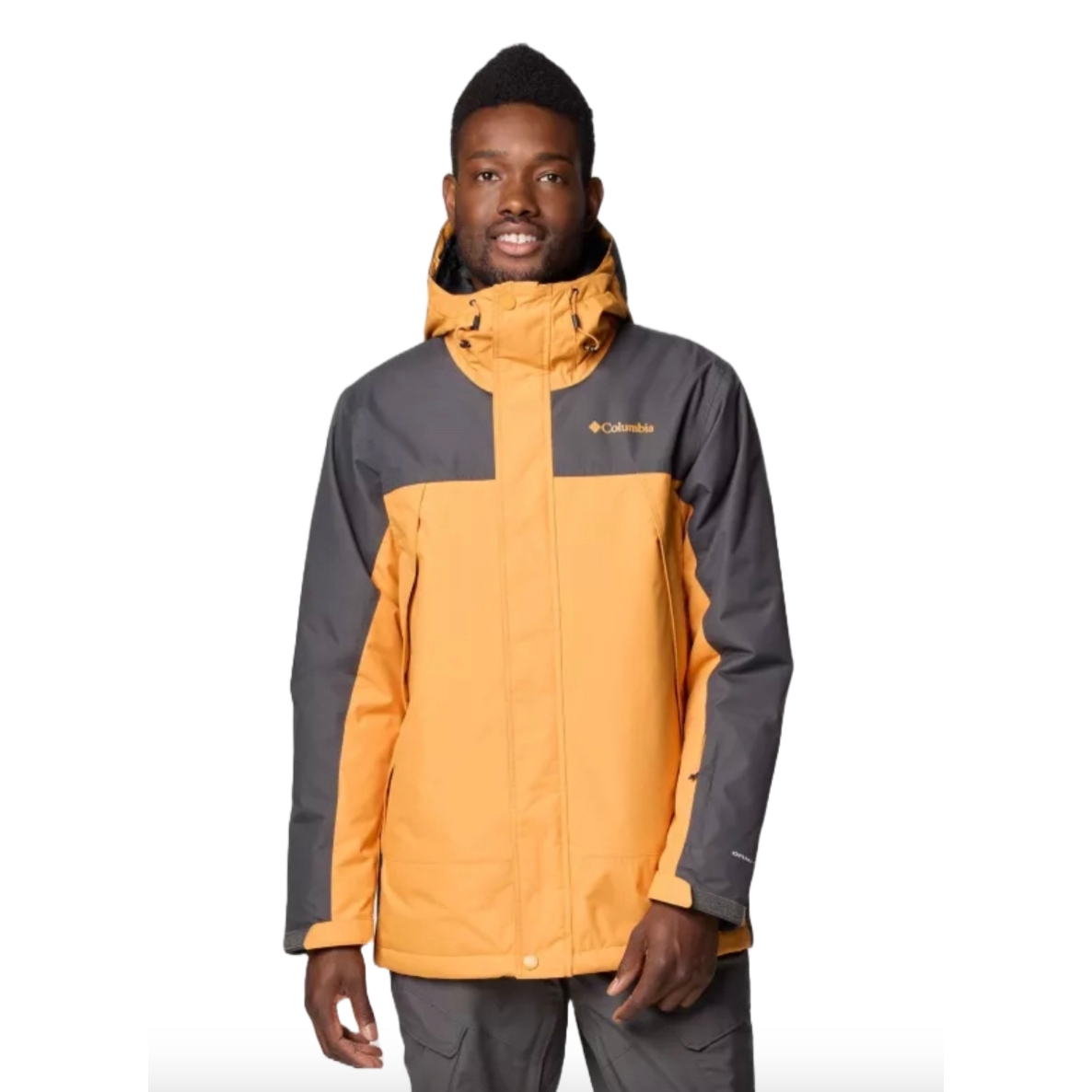 Columbia Shotski Jacket is a two-tone outerwear piece featuring a gray and orange color scheme, with a high collar and hood for added weather protection.