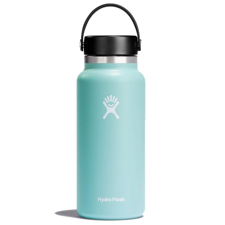 A light blue Hydro Flask water bottle with a black handle and lid, featuring the brand's logo on the front.
